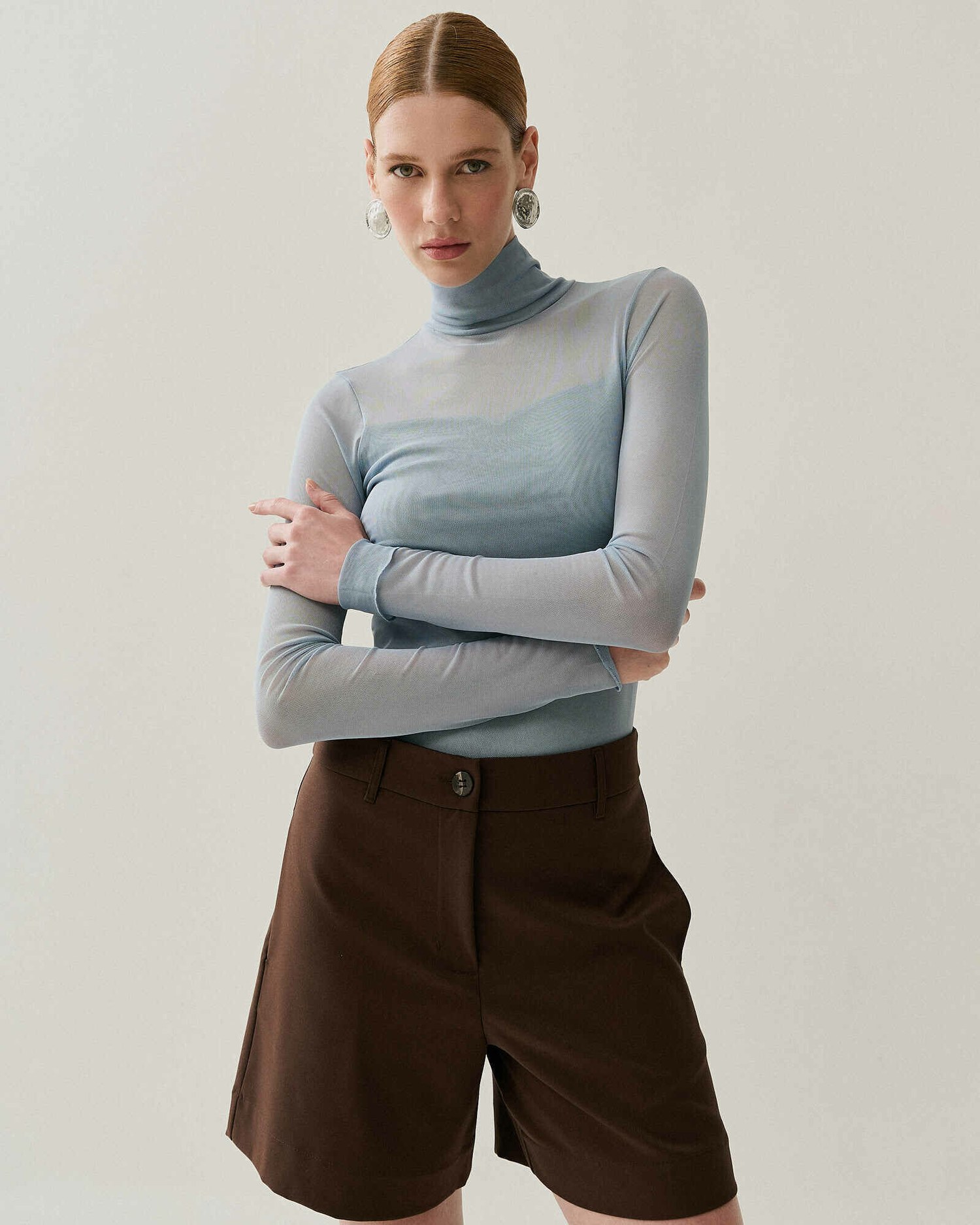 BLUSA GOLA ALTA TRANSPARENTE