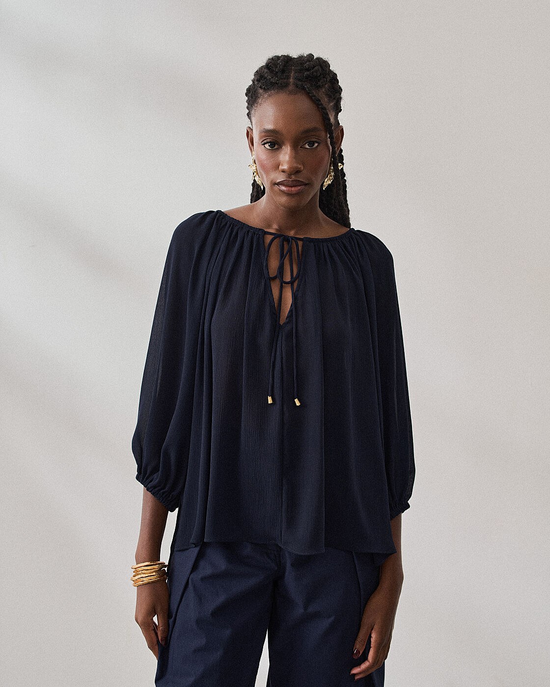 BLUSA FRANZIDA COM TRANSPARENCIA